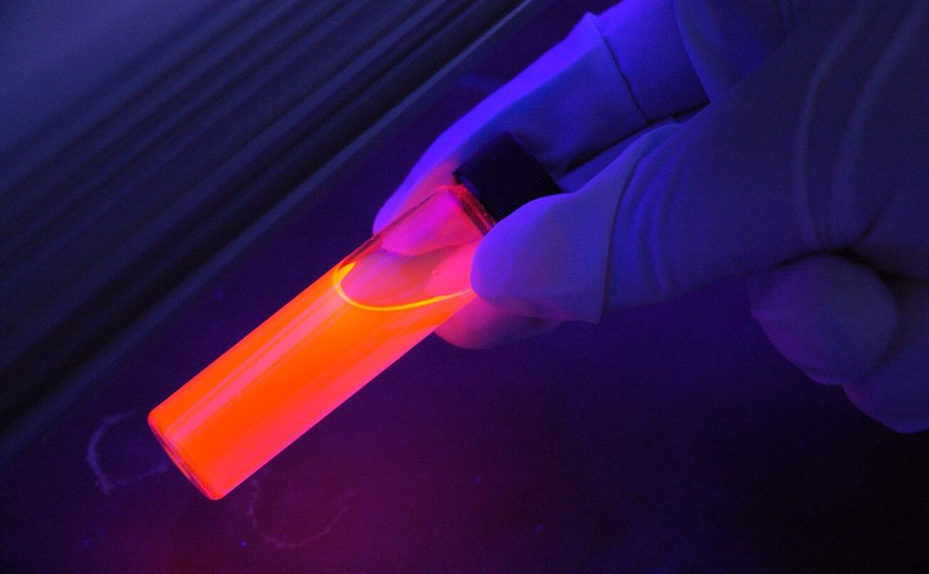 Photo of glowing test tube