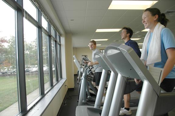 Photo of students using the weight room